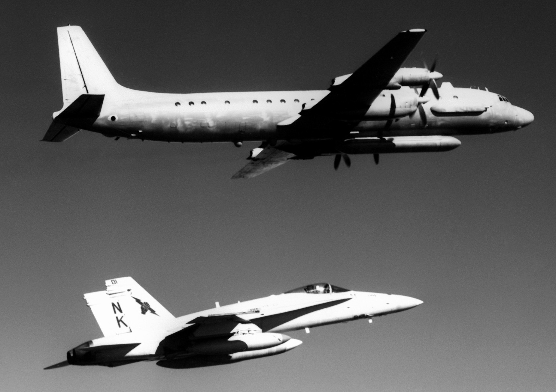 vfa-25 fist of the fleet f/a-18c hornet escorting soviet il-20 coot-a electronic reconnaissance aircraft