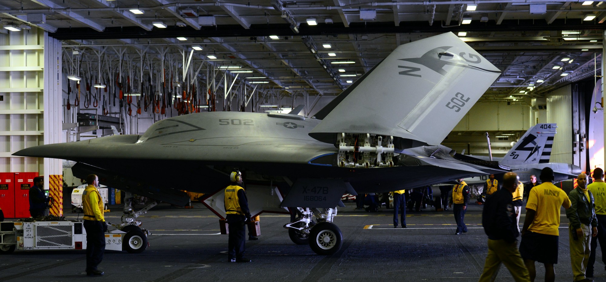 cvn-77 uss george h w bush x-47b uav tests hangar bay 2013 04
