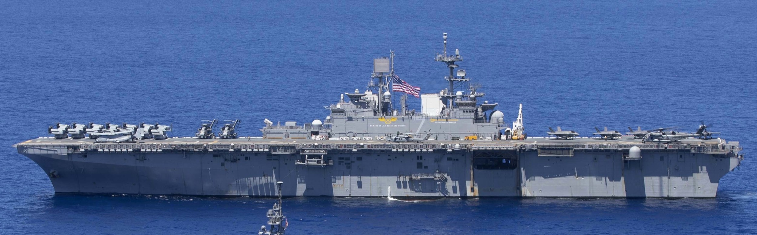 lha-7 uss tripoli america class amphibious assault ship landing us navy marines vmm-262 philippine sea 64