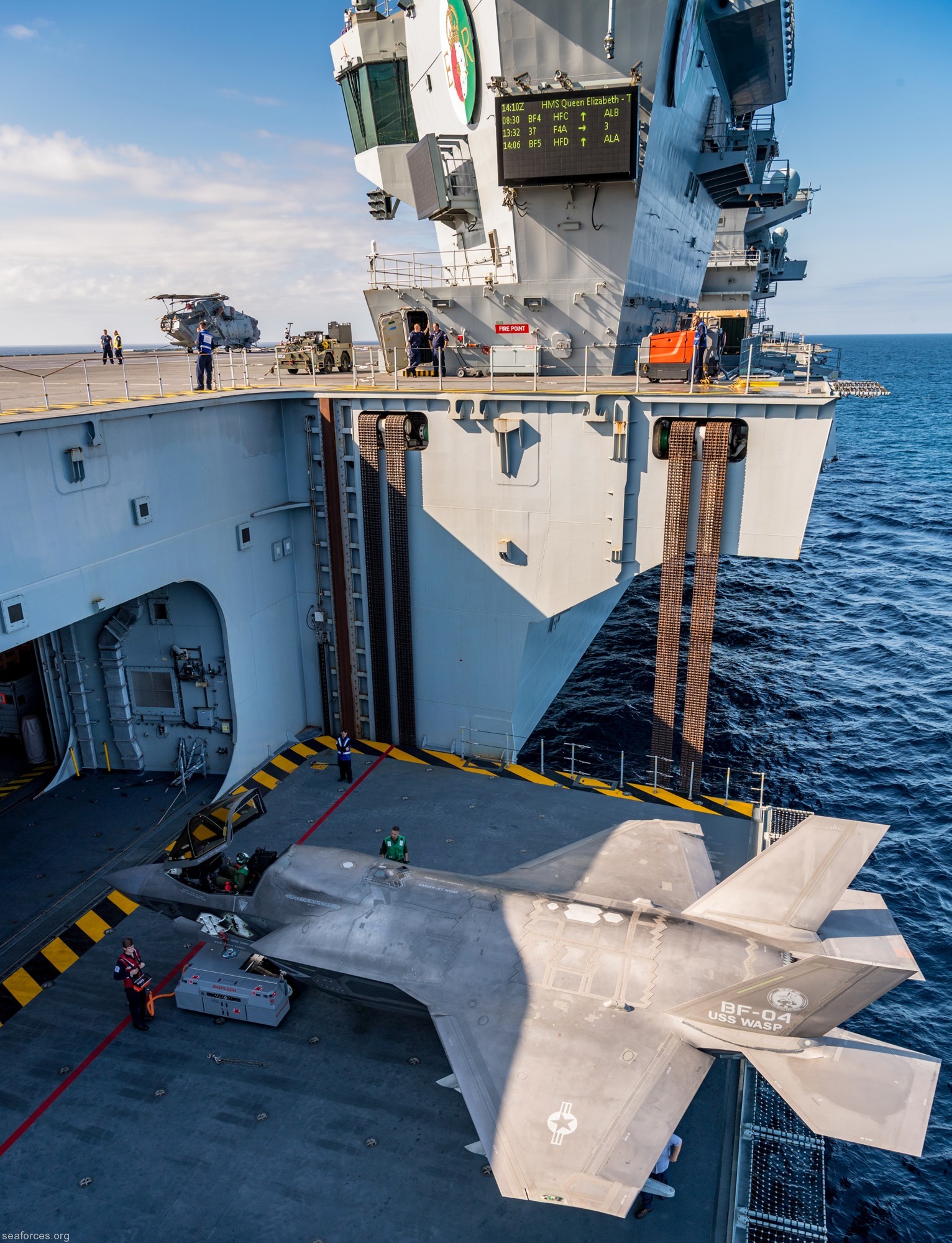 hms queen elizabeth r-08 aircraft carrier royal navy 34 hangar elevator