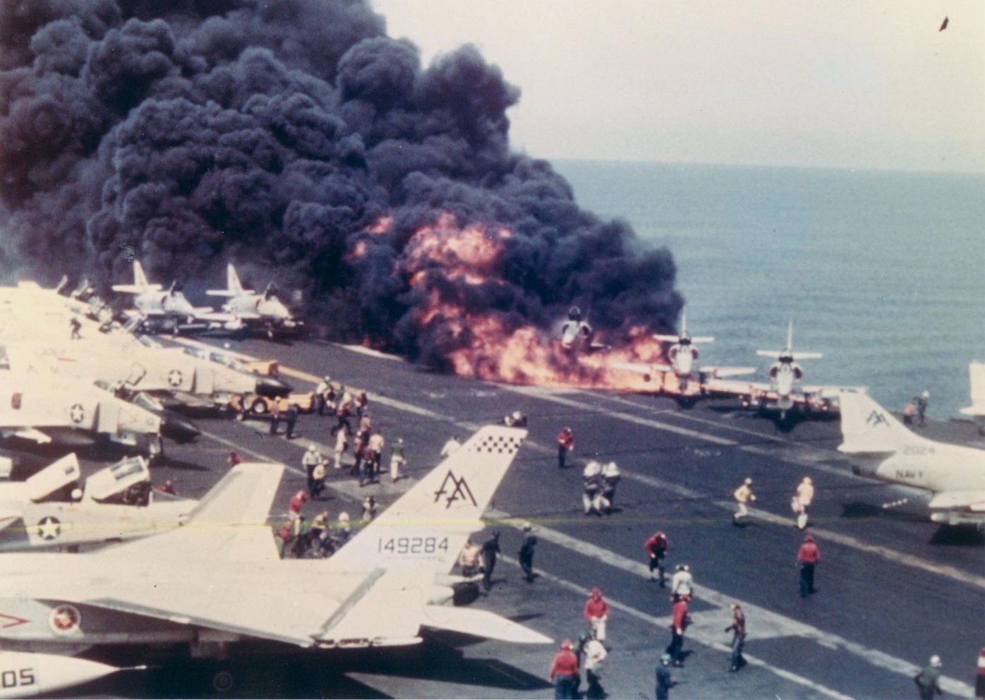 cv-59 uss forrestal aircraft carrier us navy zuni rocket fire damage 09
