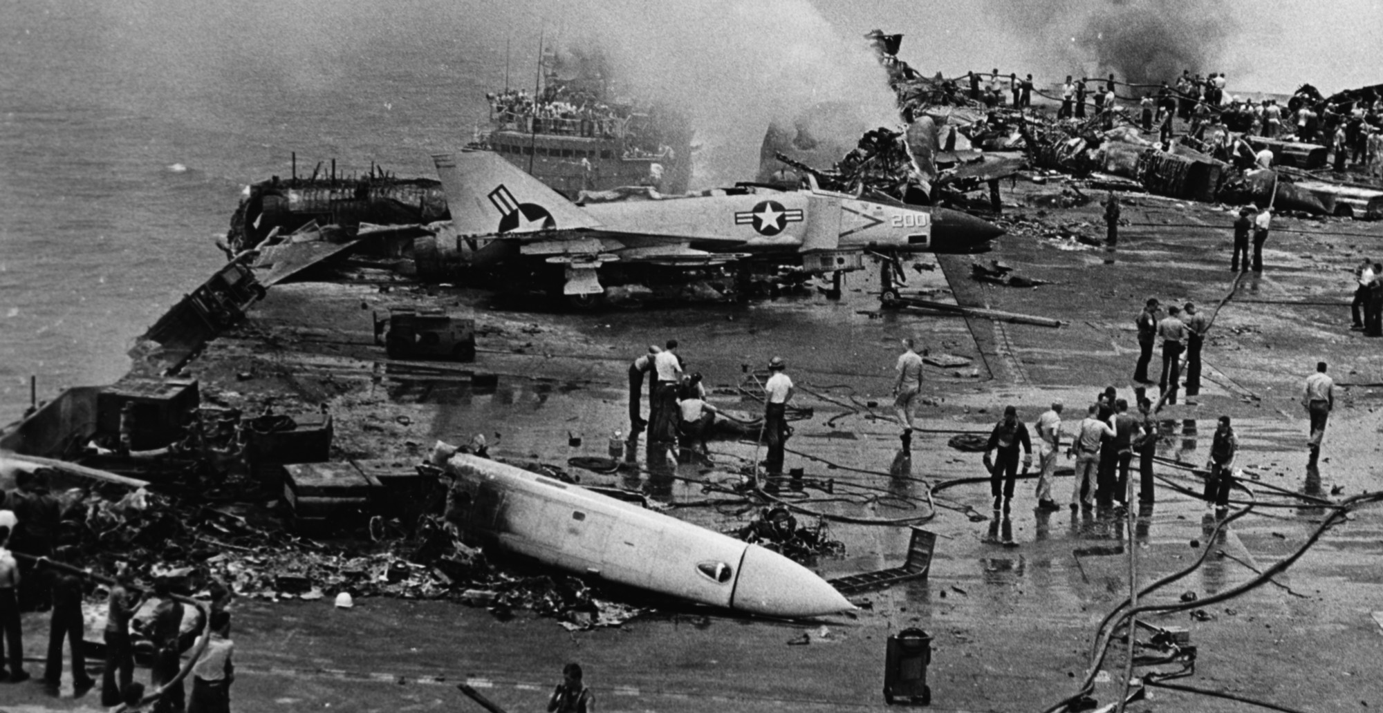 cv-59 uss forrestal aircraft carrier us navy zuni rocket accident fire damage 1967 52