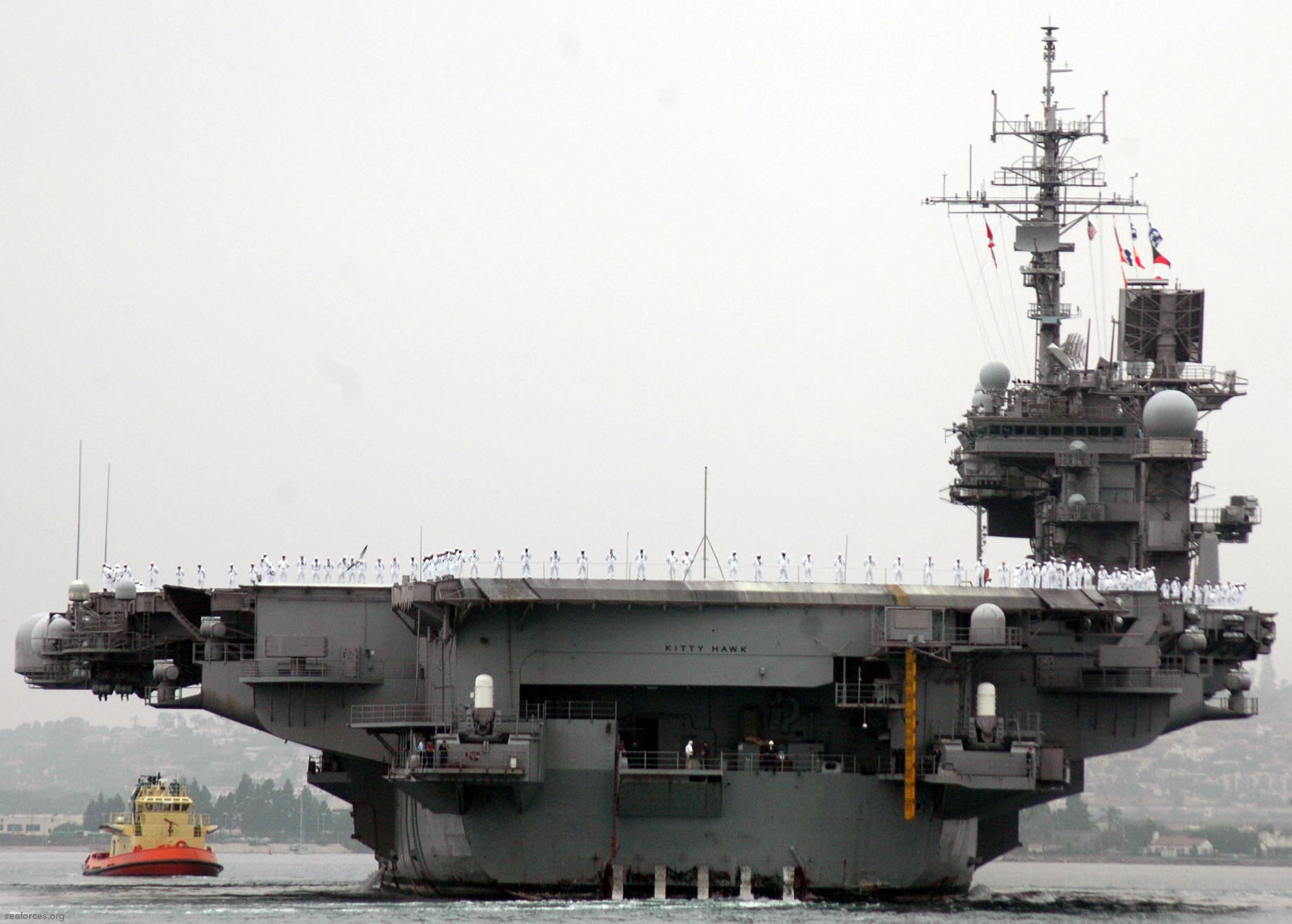 cv-63 uss kitty hawk aircraft carrier us navy departing san diego 09