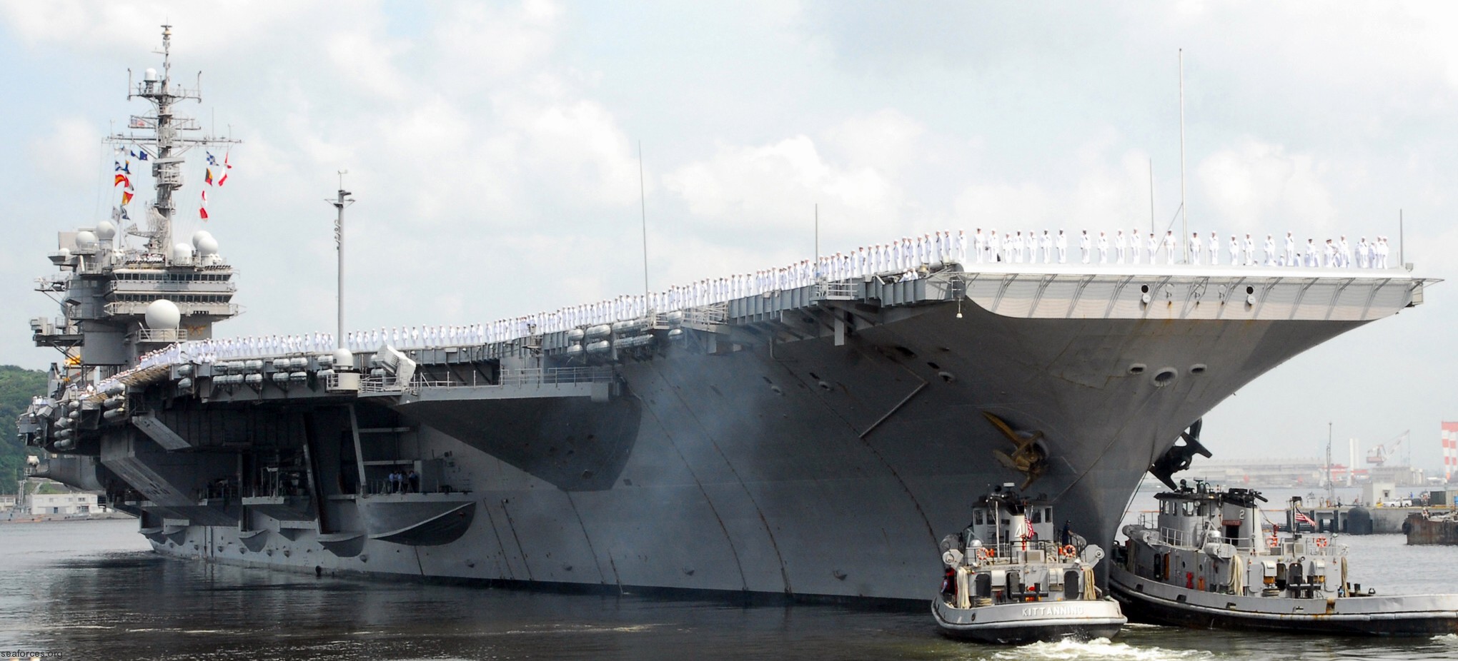 cv-63 uss kitty hawk aircraft carrier us navy 49 departing yokosuka