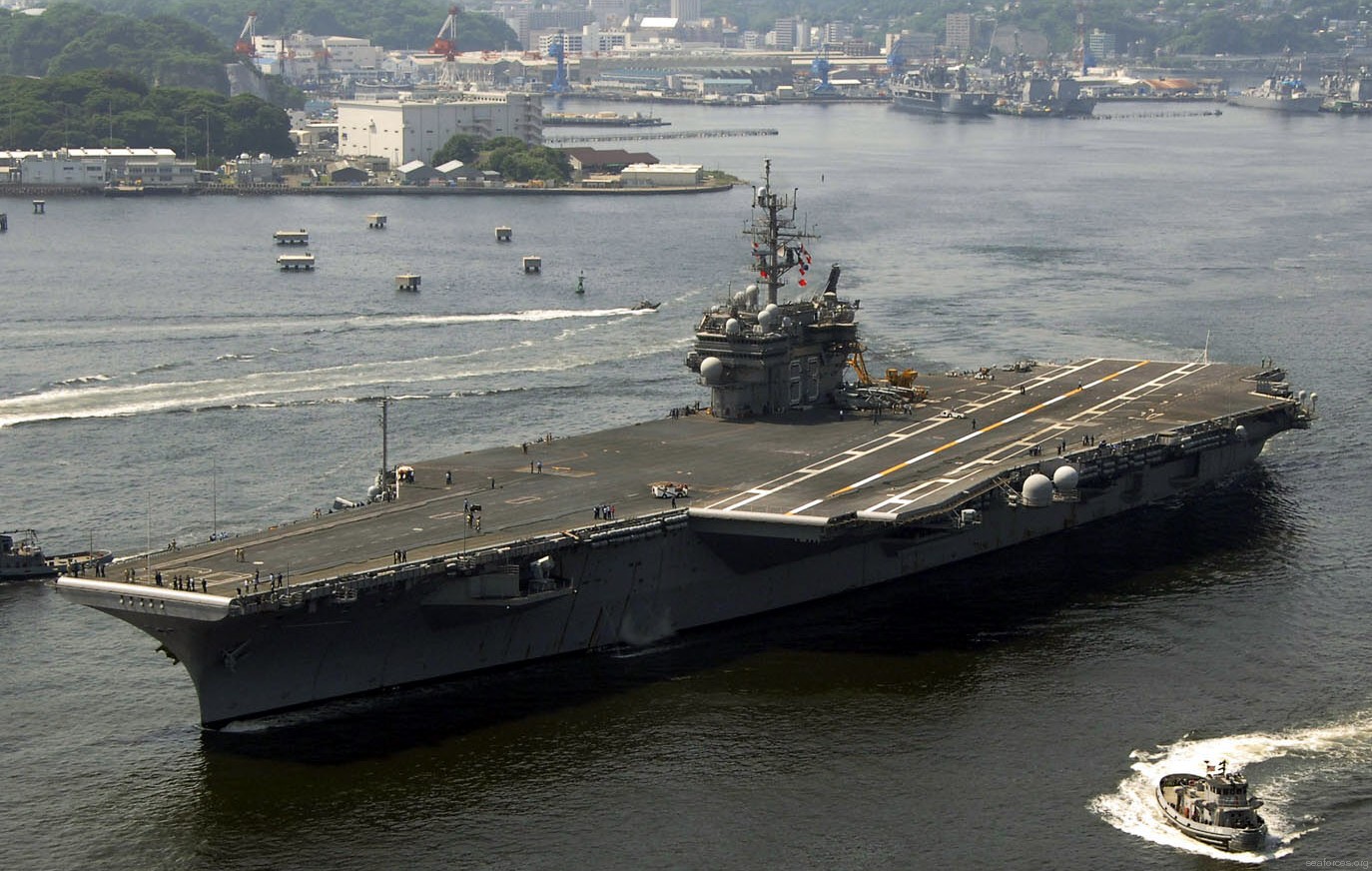 cv-63 uss kitty hawk aircraft carrier 105 departing yokosuka