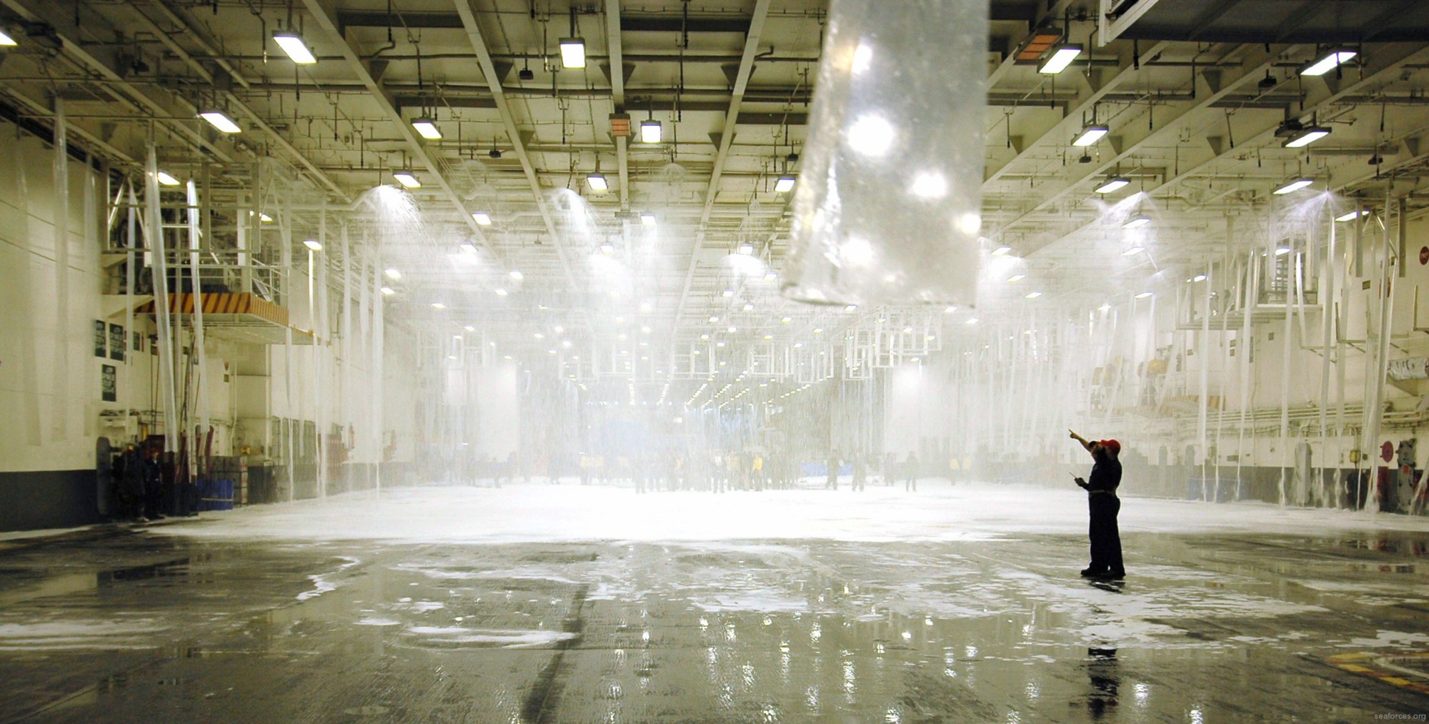 cv-63 uss kitty hawk aircraft carrier aqueous film forming foam afff hangar