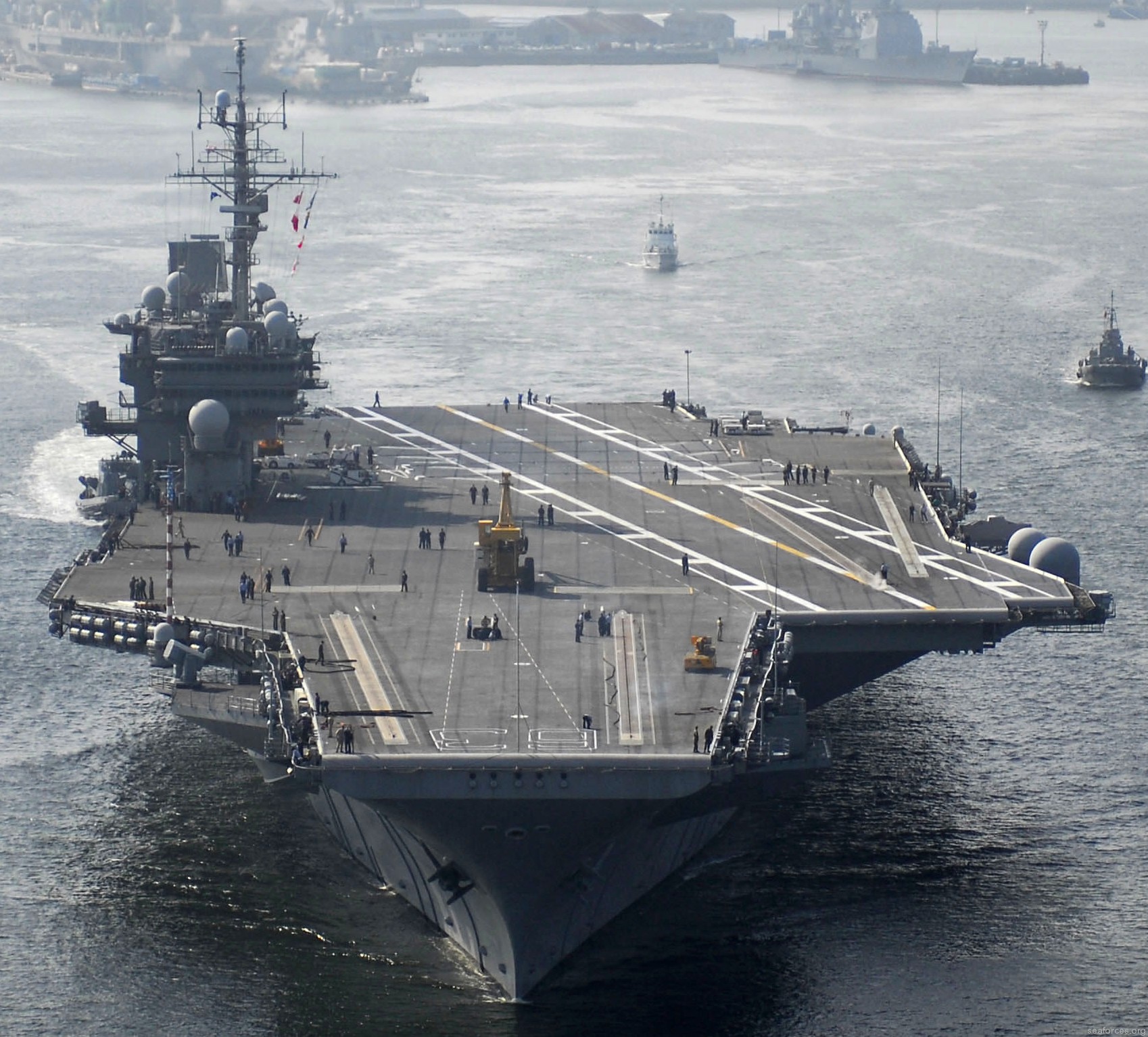 cv-63 uss kitty hawk aircraft carrier us navy 118 departing yokosuka