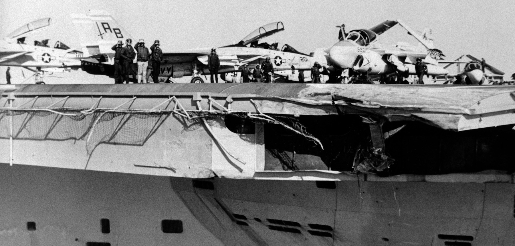 damage aboard USS John F. Kennedy after a collision with USS Belknap (CG 26) on December 22, 1975