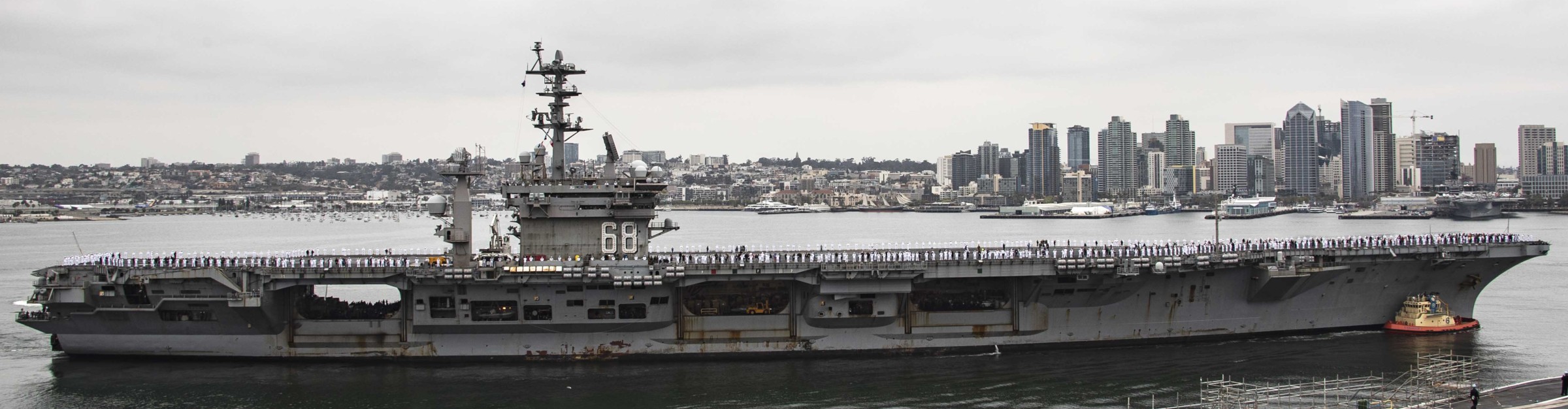 cvn-68 uss nimitz aircraft carrier us navy arriving san diego california disembark air wing 297