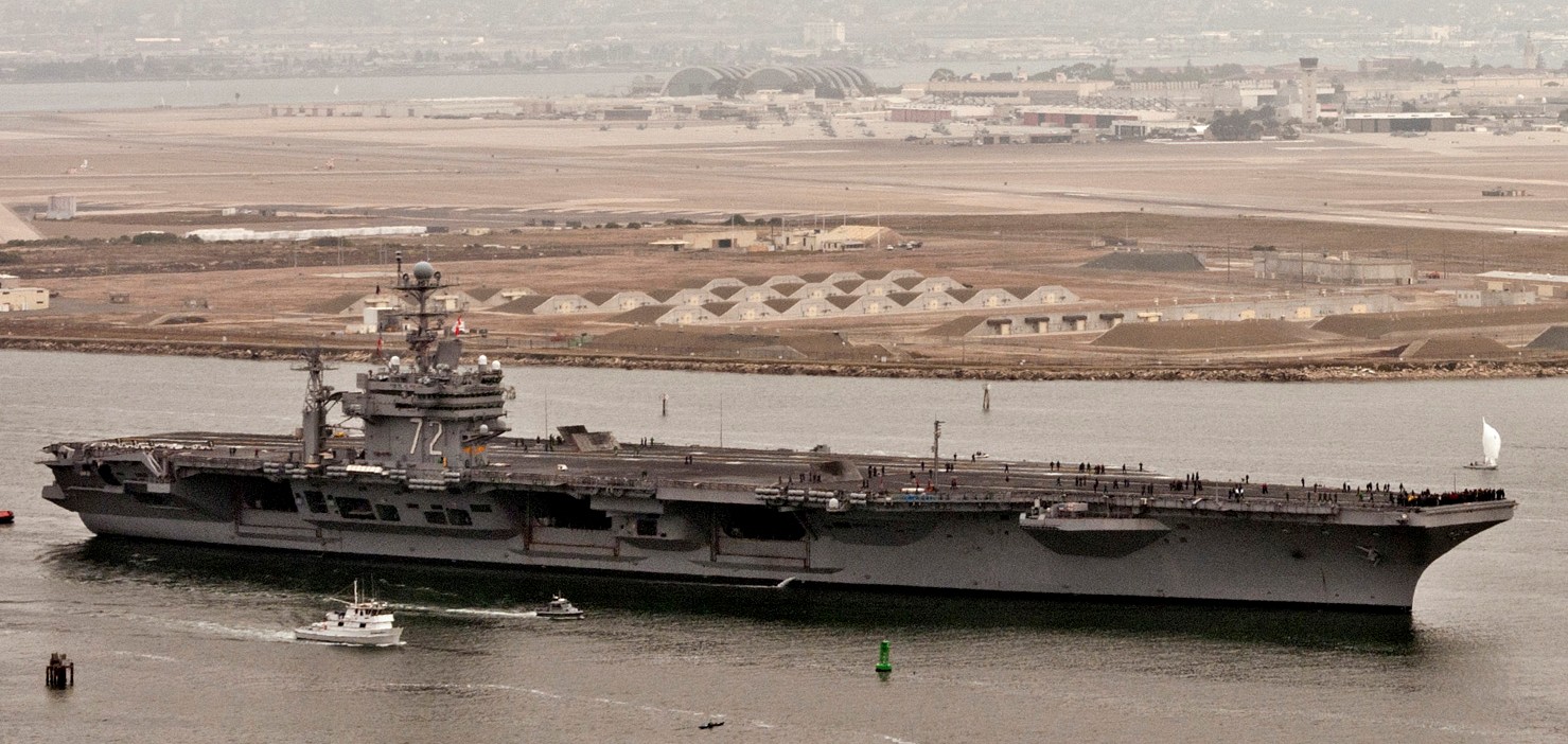 cvn-72 uss abraham lincoln nimitz class aircraft carrier us navy departing san diego p64