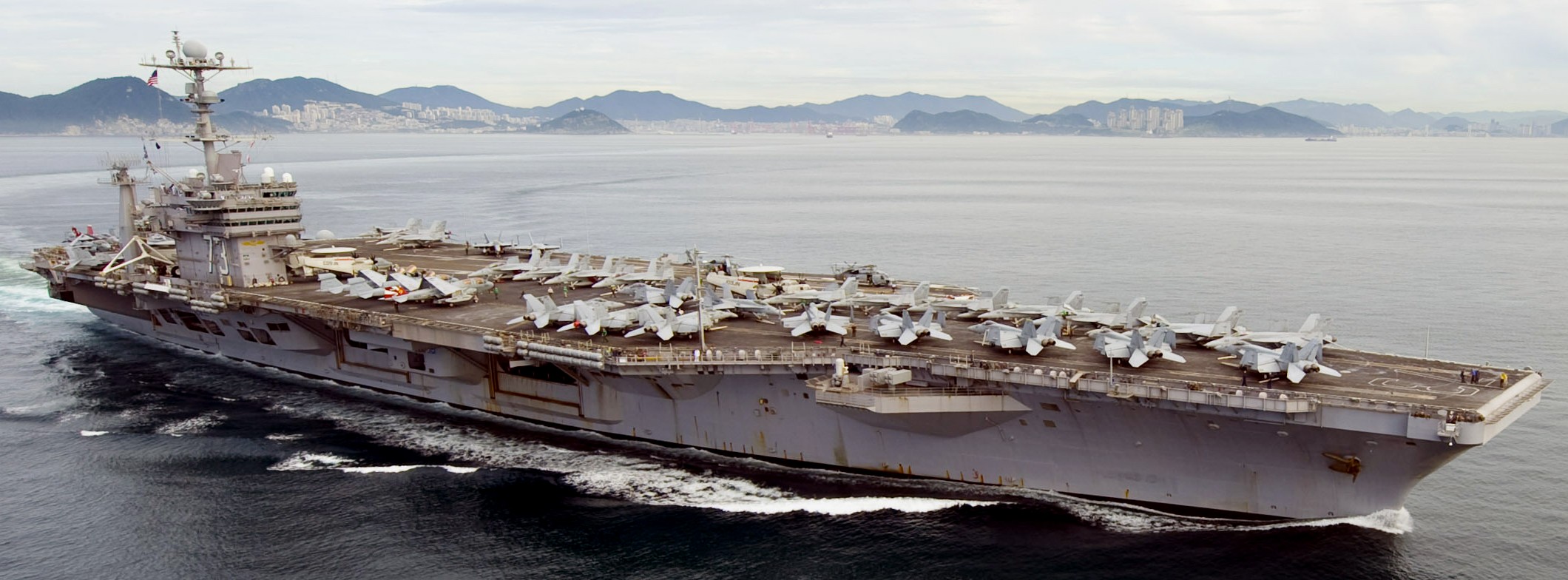 cvn-73 uss george washington nimitz class aircraft carrier air wing cvw-5 departing busan 90