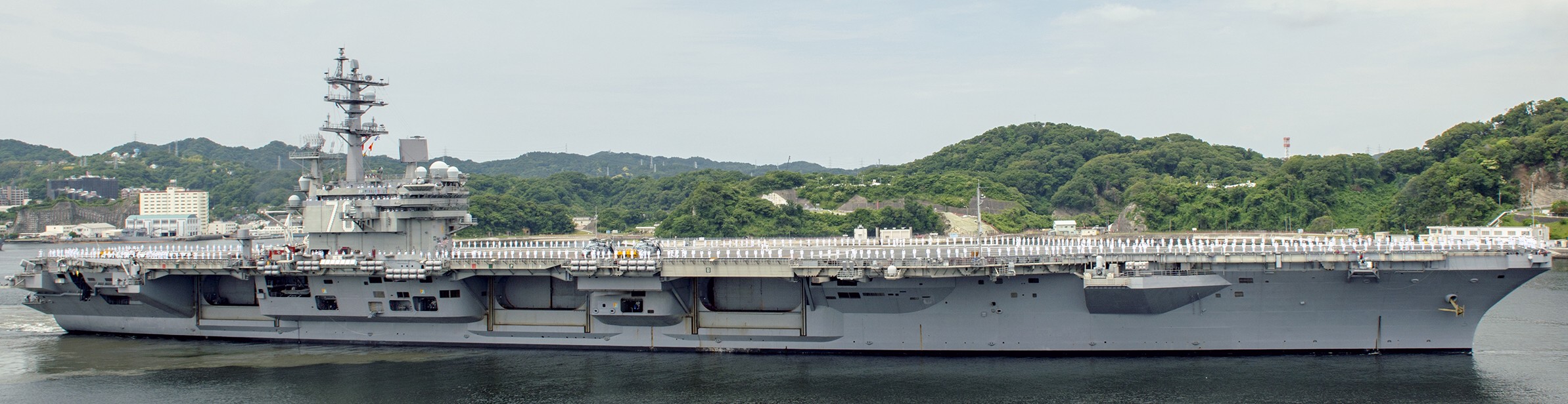 cvn-76 uss ronald reagan nimitz class aircraft carrier departing yokosuka 111