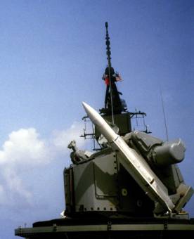 USS Sampson DDG-10 fires a RIM-66 SM-1MR Standard missile from her Mk-11 missile launcher