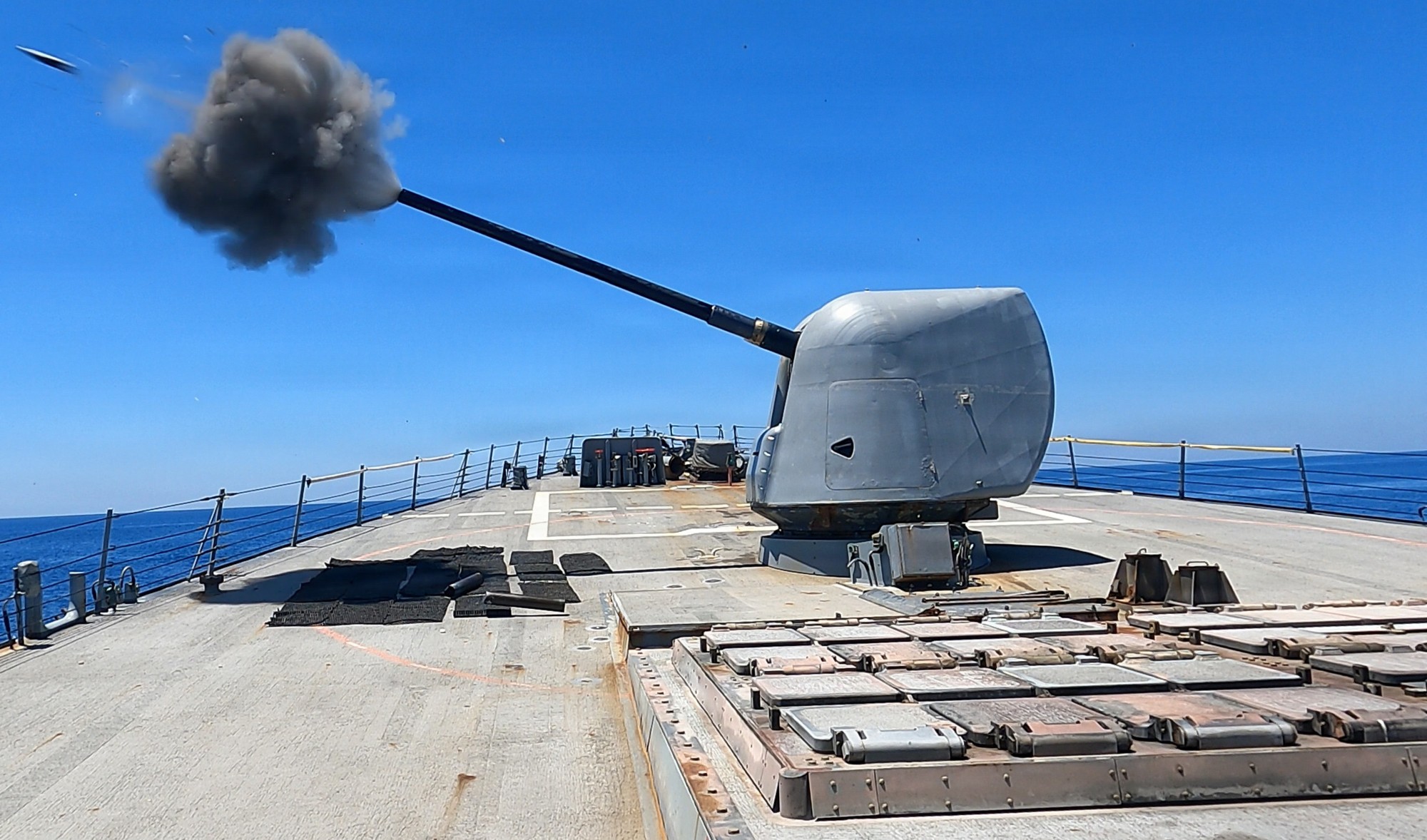 uss arleigh burke ddg-51 guided missile destroyer aegis mk.45 gun fire 2026 150