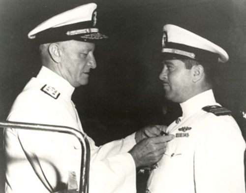 LCDR Thomas Burton Klakring receives the Navy Cross from Admiral Nimitz