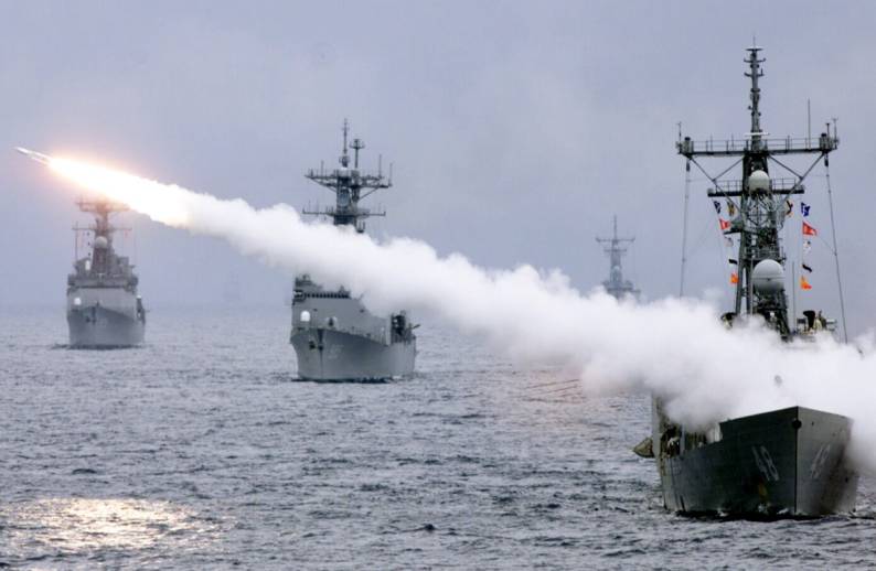 FFG-48 USS Vandegrift fires a Standard SM-1MR missile from Mk-13 launcher