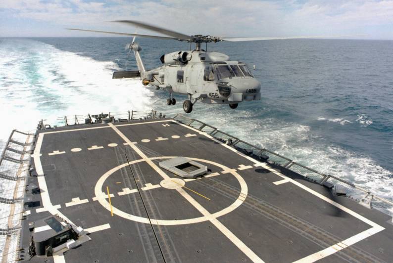 Sikorsky SH-60B Seahawk LAMPS III lands on the flight deck of USS Doyle FFG-39