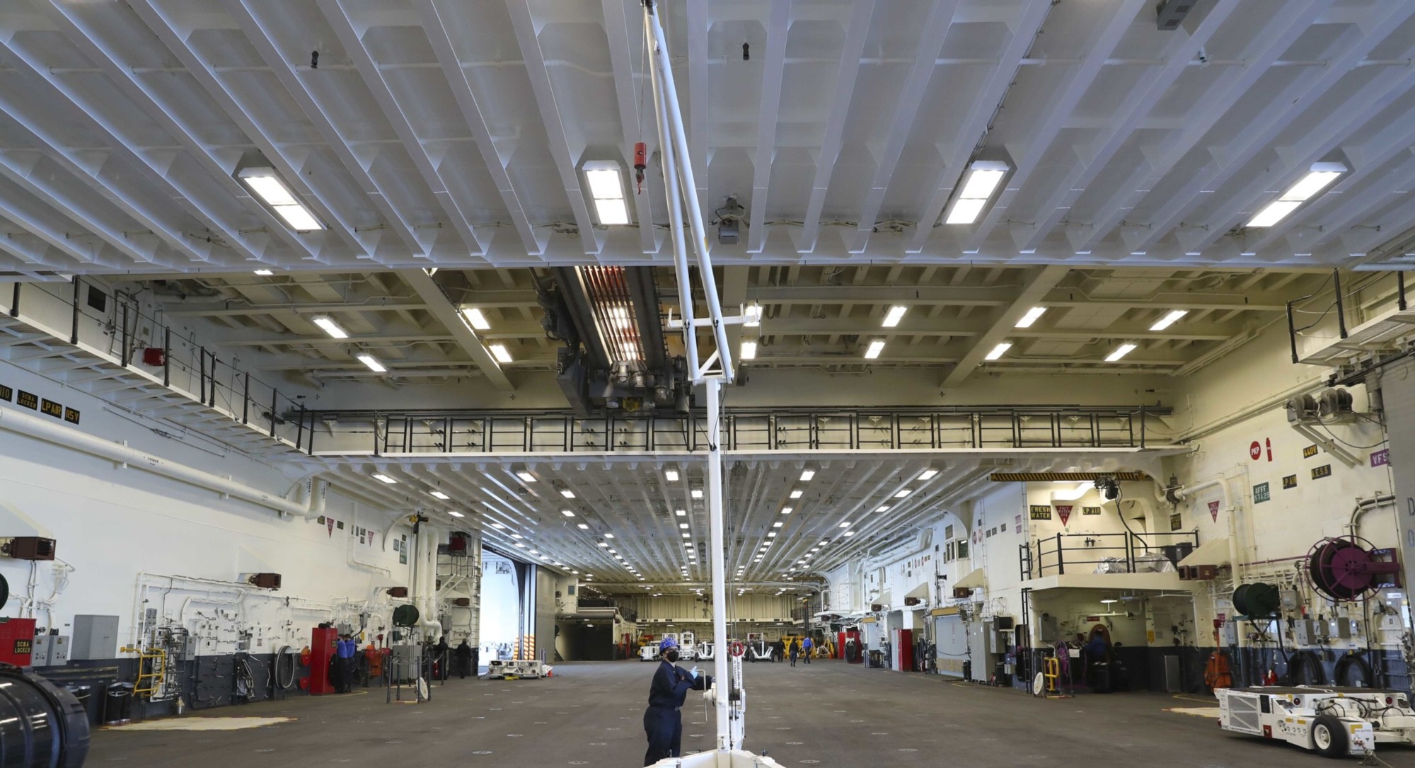 lha-7 uss tripoli america class amphibious assault ship landing us navy hangar deck bay 22