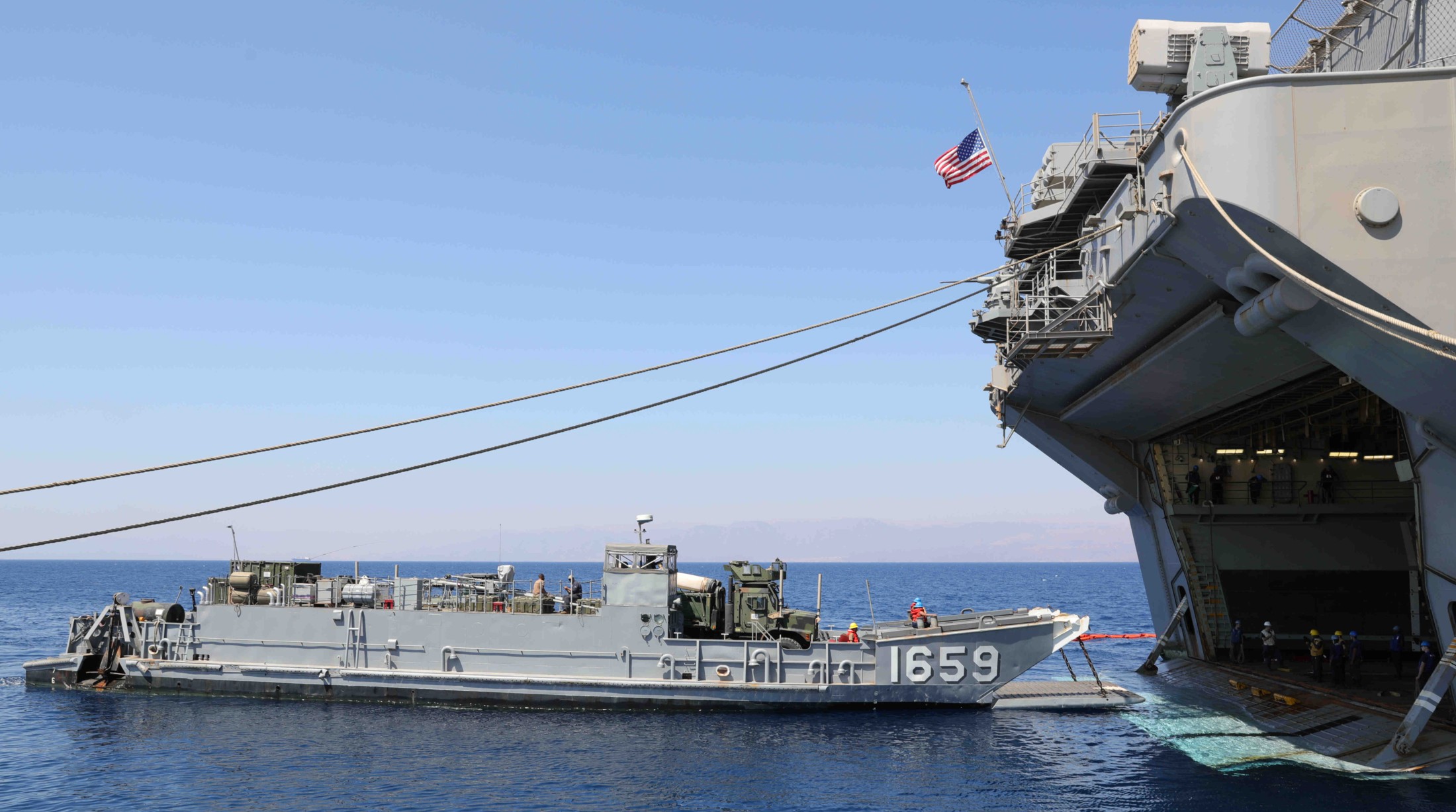 lhd-5 uss bataan wasp class amphibious assault ship dock landing helicopter us navy vmm-365 marines lcu well deck 137