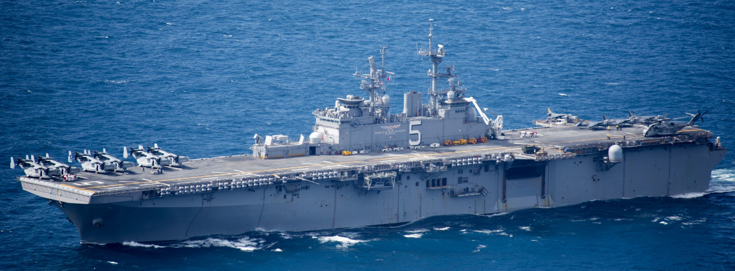 lhd-5 uss bataan wasp class amphibious assault ship dock landing helicopter us navy vmm-365 marines 148