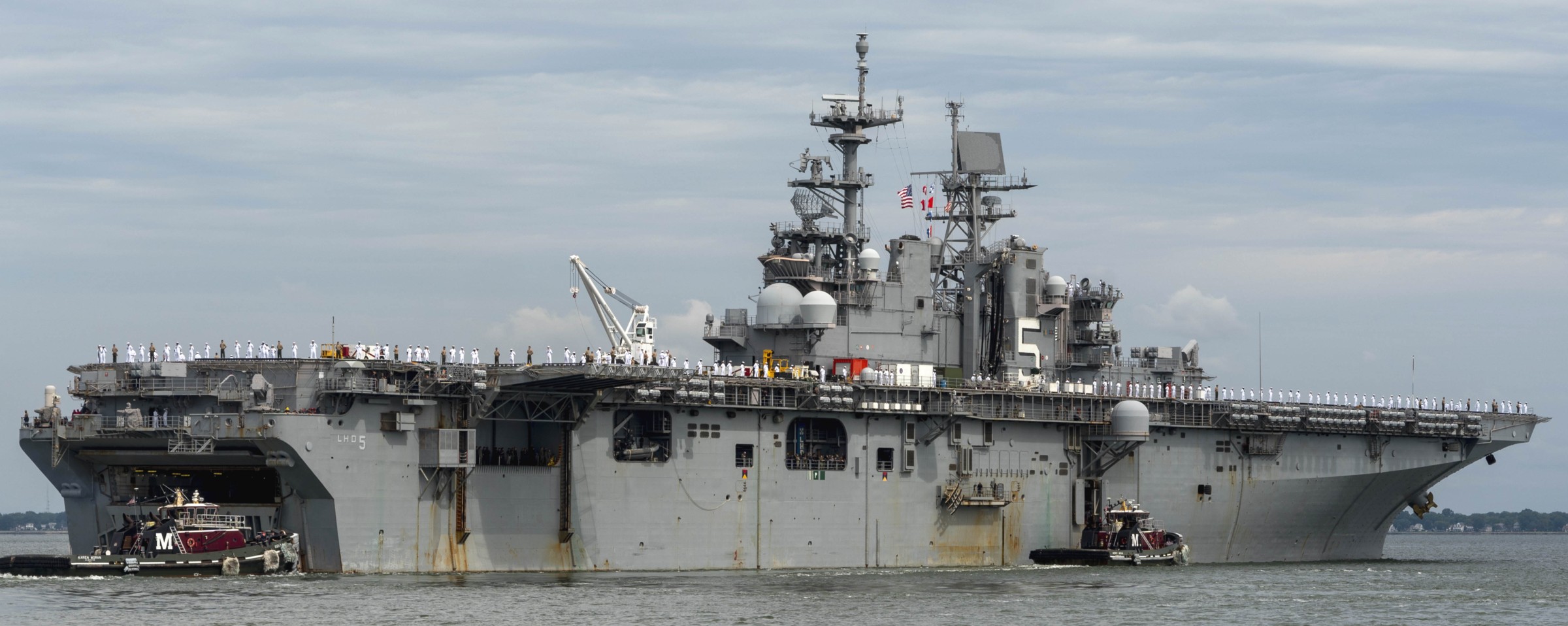 lhd-5 uss bataan wasp class amphibious assault ship dock landing helicopter us navy departing norfolk virginia 191