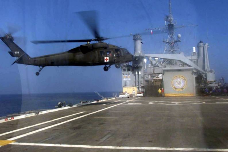 USS Denver LPD-9 an US Army HH-60G Pave Hawk lands on the flight deck during exercise Kernel Blitz 2001